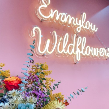 Custom Neon® sign in a script font for a boutique florist @emmylouwildflowers