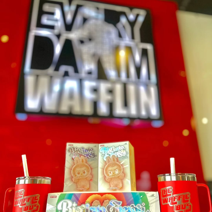 Everyday I'm wafflin black and white Custom Neon® LED neon sign on a red wall @thewafflebus