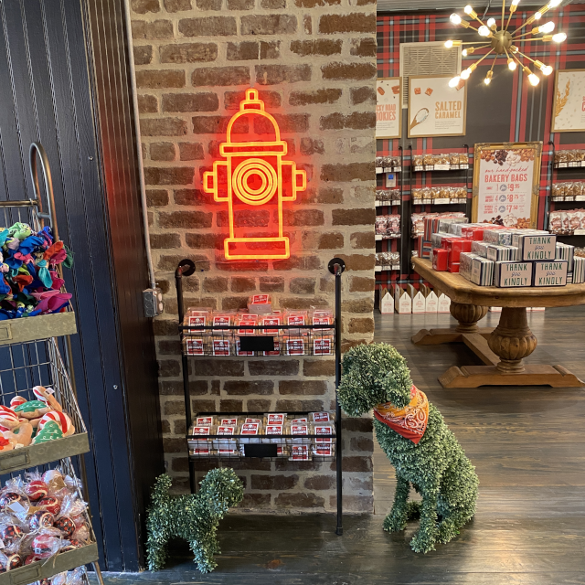 Red fire hydrant wall art for a bakery by Custom Neon® @byrdcookiecompany