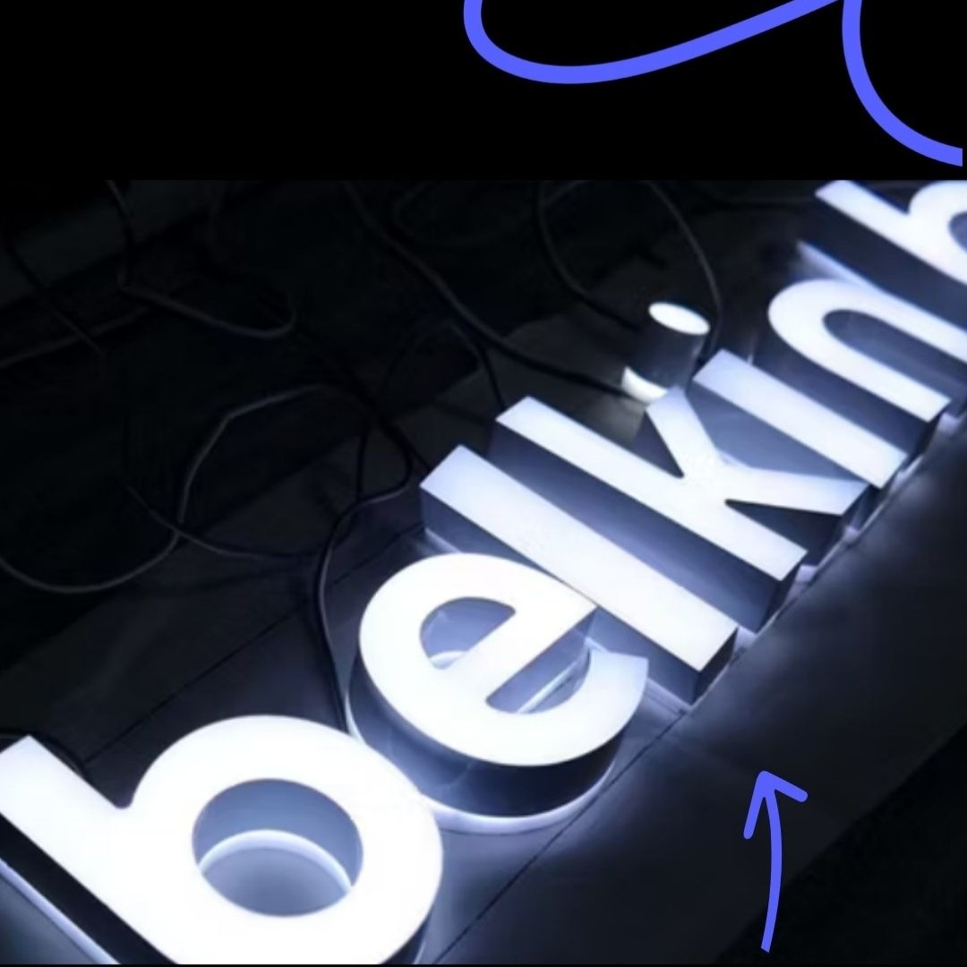 Front and back lit sign illuminated with white LED light