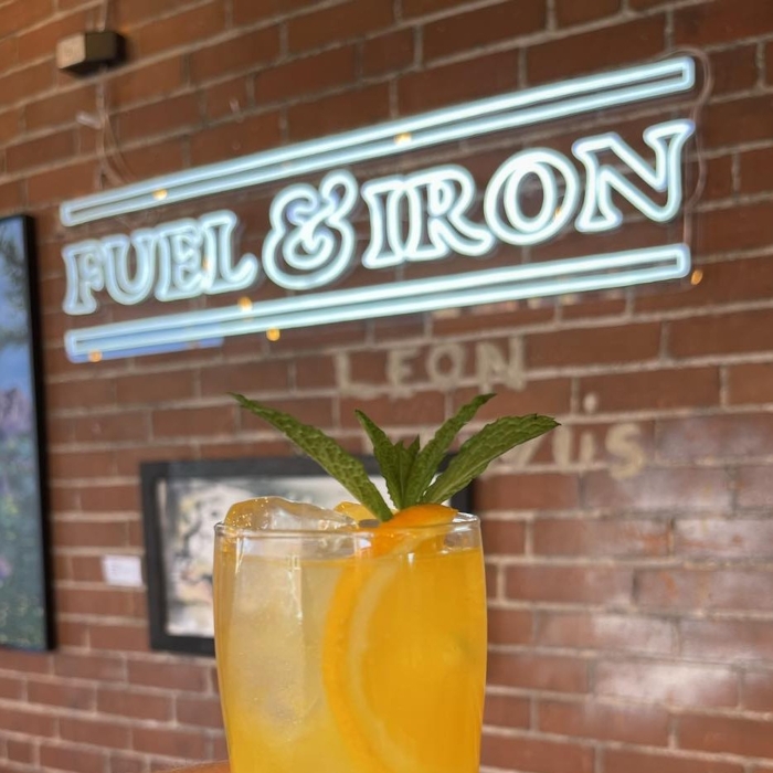 White Custom Neon® sign for Denver Bar @fuelandironpueblo