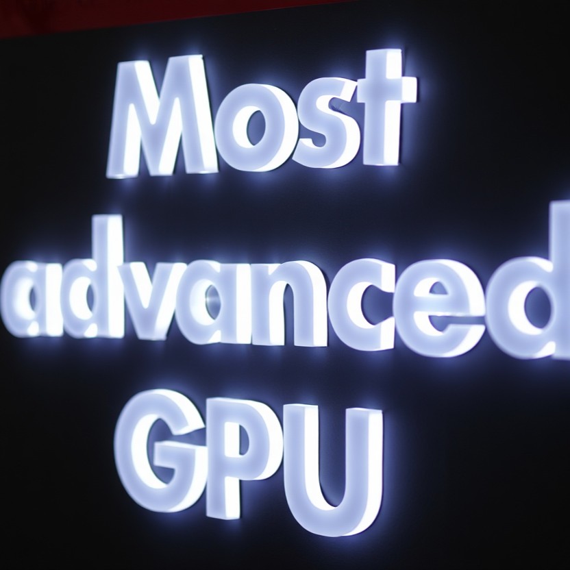 White fully illuminated LED sign on a black wall