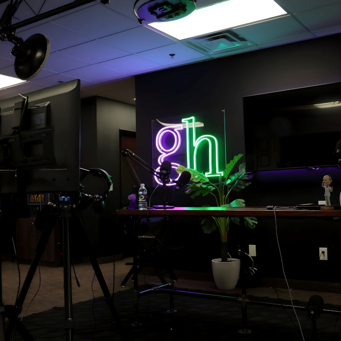Green and purple Custom Neon® office logo sign @gaylordhansenteam