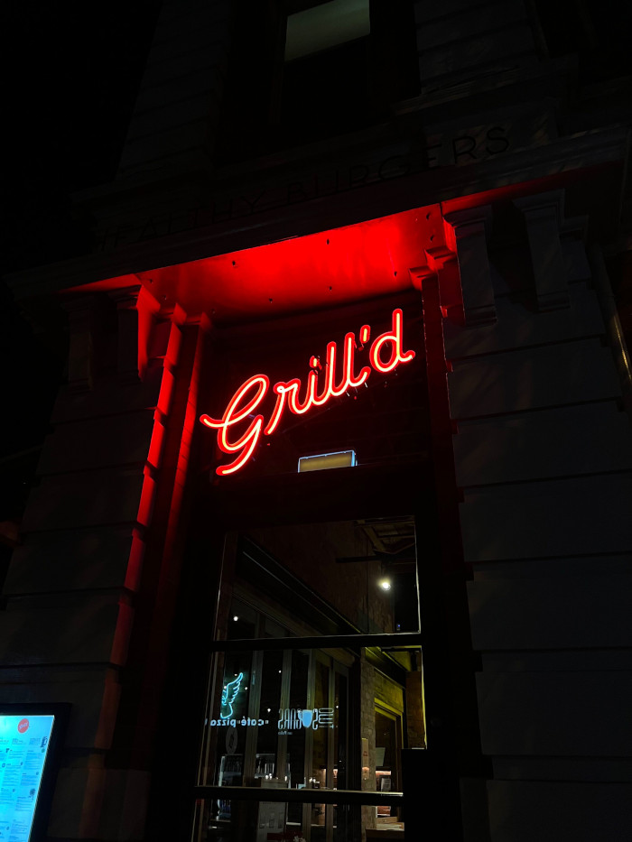 Custom Neon® LED neon channel letter outdoor sign above the door to @grilldburgers