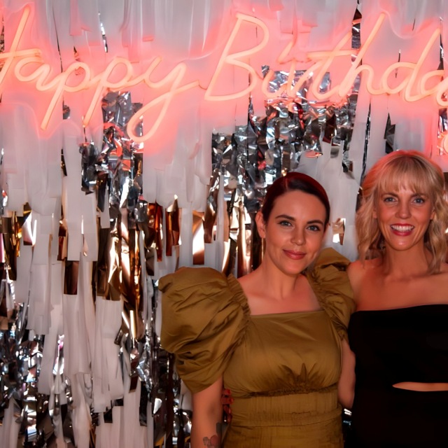 Happy Birthday Custom Neon® light backdrop on a streamer wall photo booth @thewarehouse