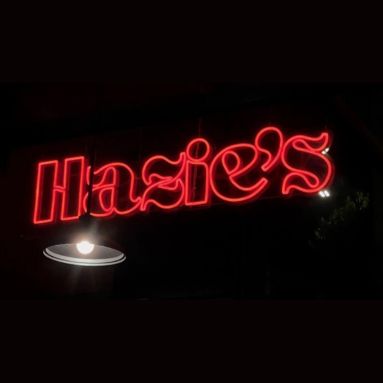 Red Custom Neon® logo window sign with hanging wires @haziesonhayes