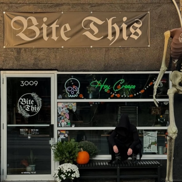 Green Custom Neon® window sign for Columbus retailer @bitethisbyannie