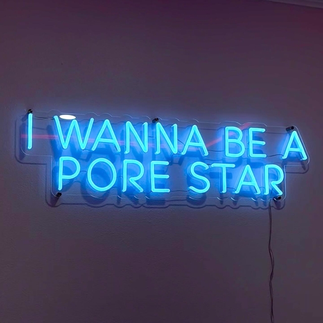 Blue Custom Neon® beauty salon quote sign @daydreamskincare