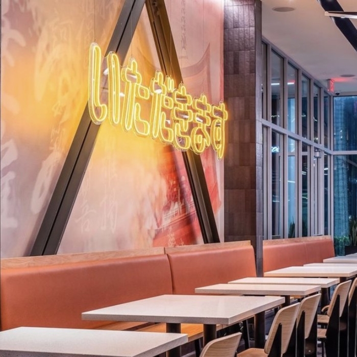 Custom Neon® yellow Japanese hiragana sign on restaurant wall @eatatbento @gdpdesignbuild