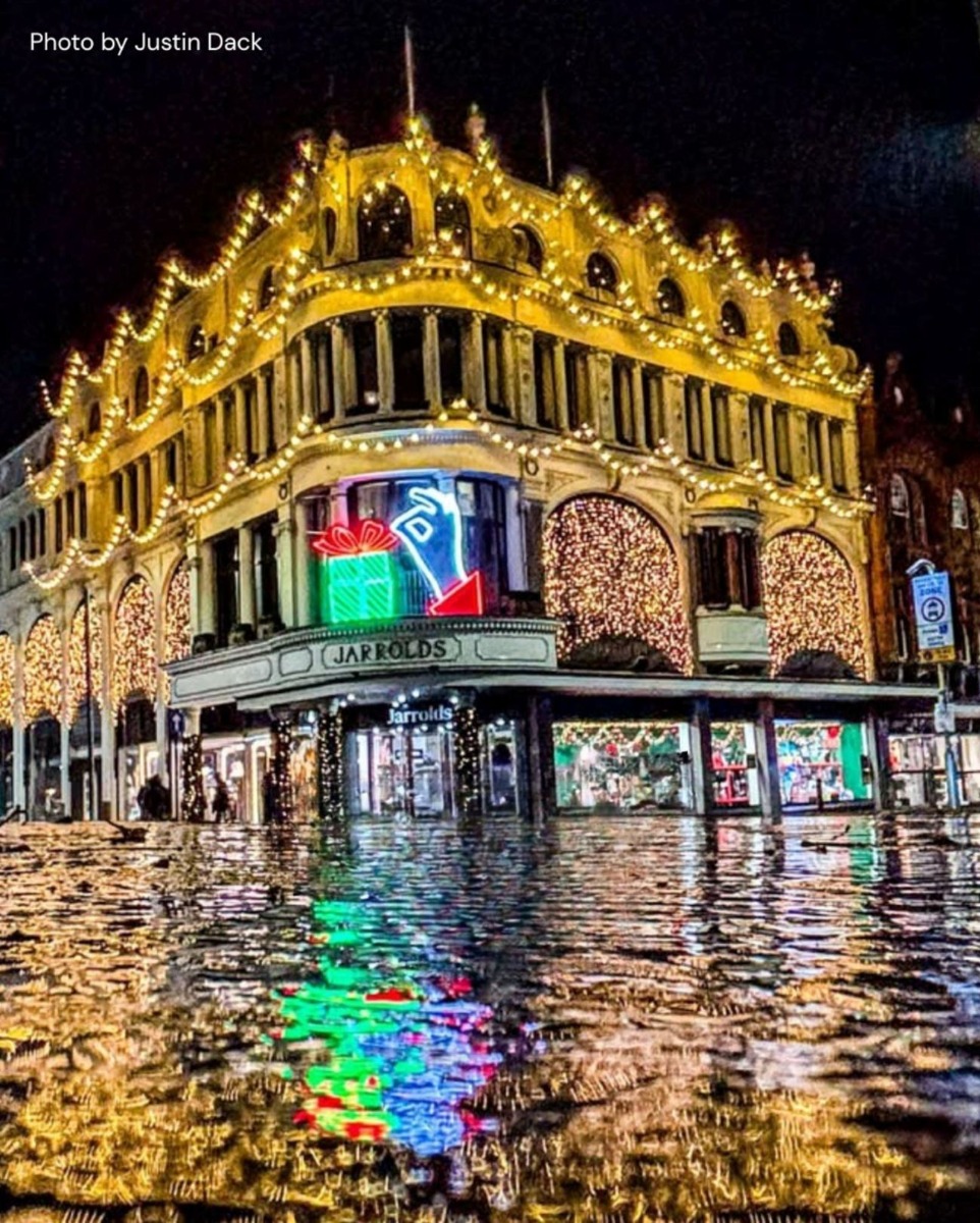 Custom Neon® lighted Christmas decorations on the storefront of @jaroldnorwich department store