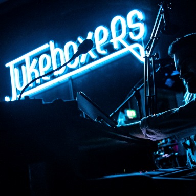 Tropical blue Custom Neon® piano bar logo @jukeboxersbar