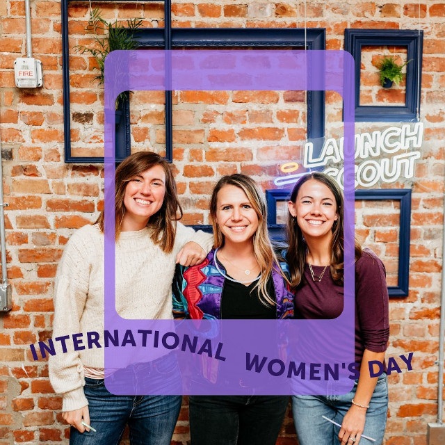 Multicolored Custom Neon® logo sign on brick wall @launchscout