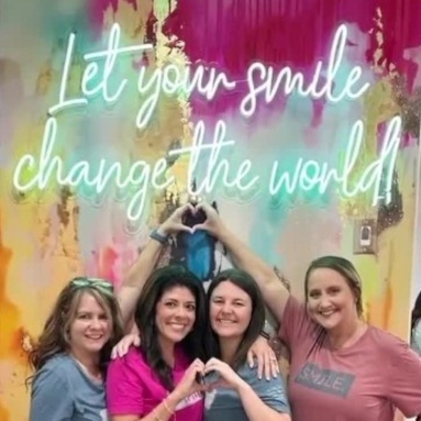 Custom Neon® Let Your Smile Change the World tagline selfie sign @peppermintsagedental