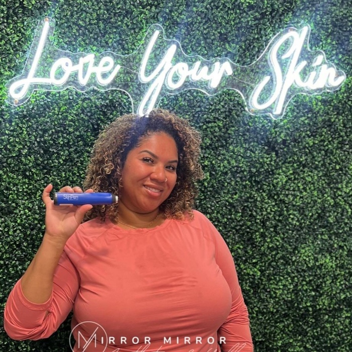 White Love Your Skin Custom Neon® green wall sign @mirrormirror_medspa
