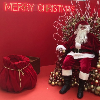 Custom Neon® red Merry Christmas light sign as part of Santas Grotto at @rhodeswaterside shopping mall