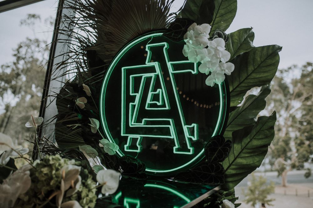 Custom Neon® mint green wedding monogram on black acrylic