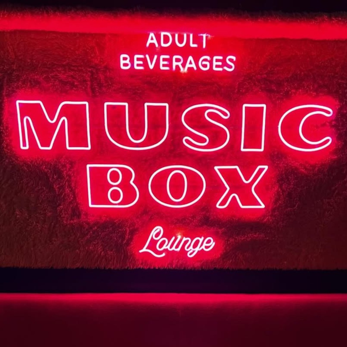 Deep pink music box lounge Custom Neon® logo sign @musicboxtucson @beccadolls