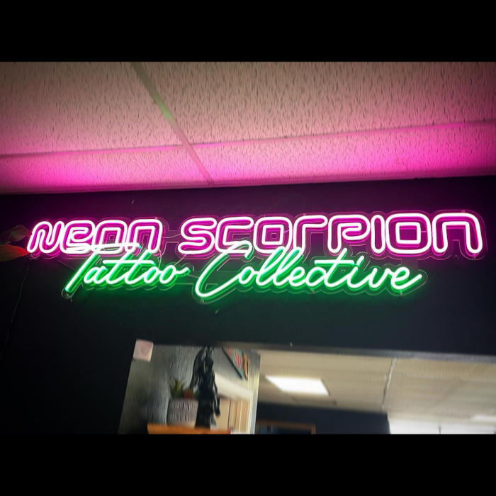 Pink and green LED Custom Neon® Neon Scorpio Tattoo Collective business sign
