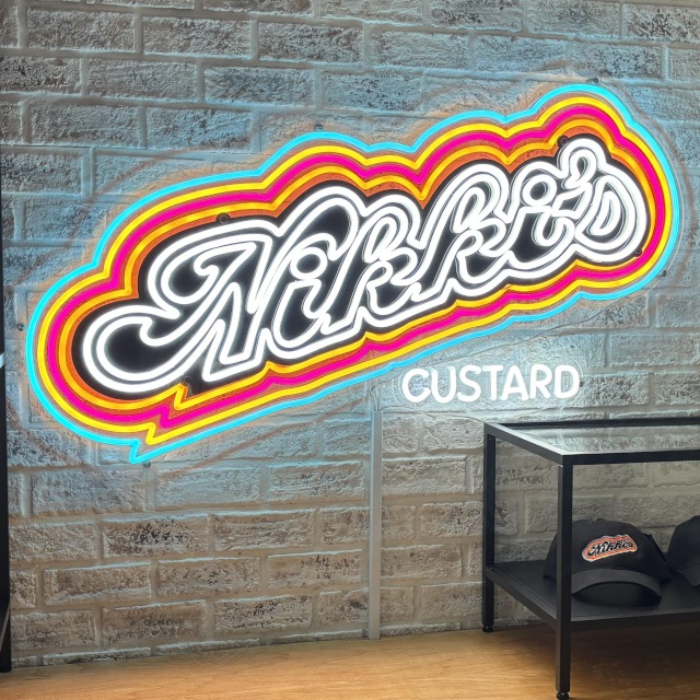 Custom Neon® white and rainbow neon logo sign for Nikki's Custard @nikkiscustard 