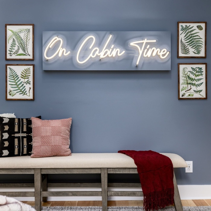 On Cabin Time white LED Custom Neon® sign on a blue feature wall designed by Somerled