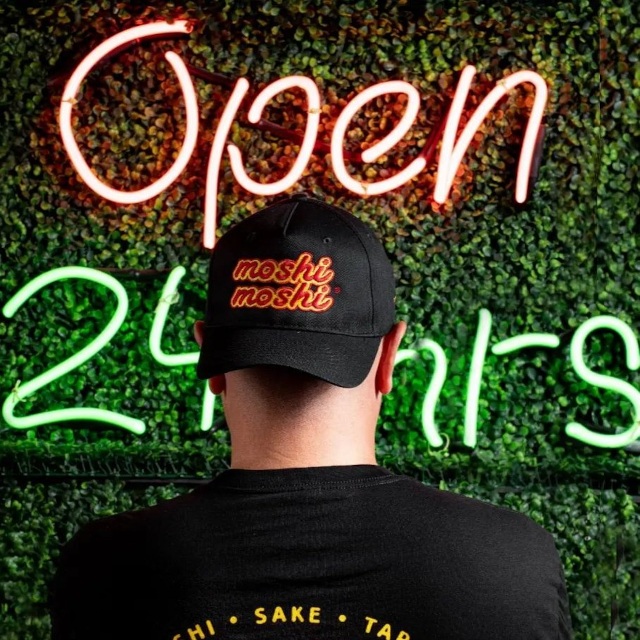 Custom Neon® restaurant open sign on green wall @moshimoshi.fun