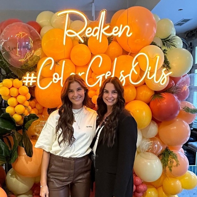 Orange hashtag feature wall sign in hair salon by Custom Neon® @chezmarcus