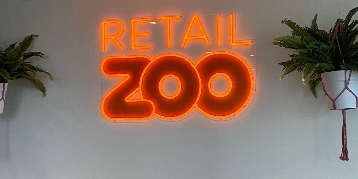 Orange Custom Neon® UV print logo sign @retailzoo