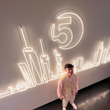 Custom Neon® Large warm white LED neon NYC skyline artwork on a white wall @5boroughbagels