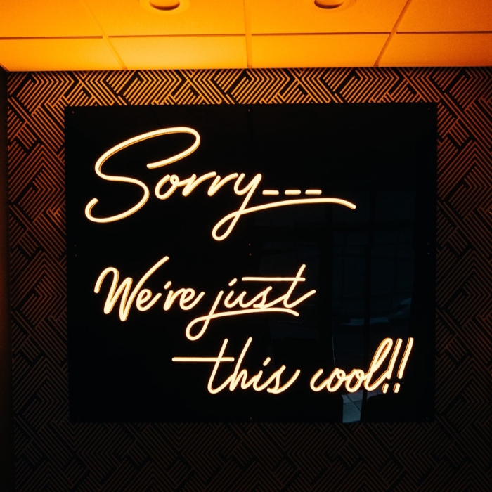 Orange Custom Neon® quote sign for Milwaukee Health Clinic @h2omke