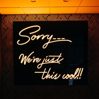 Orange Custom Neon® quote sign for Milwaukee Health Clinic