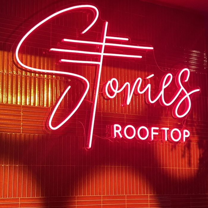 Custom Neon® color changing LED neon Stories Rooftop sign @stories.au