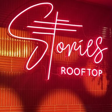Red Custom Neon® rooftop bar sign @stories.au