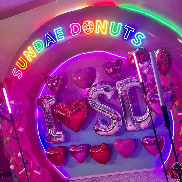 Custom Neon® multicolored name sign @sundaedonuts