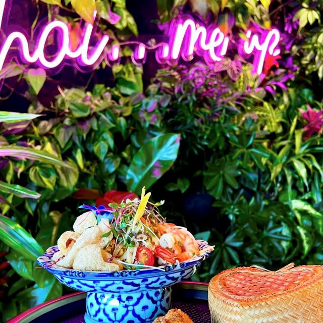 Custom Neon® Thai Me Up tagline selfie sign on greenwall @bodhi.indy