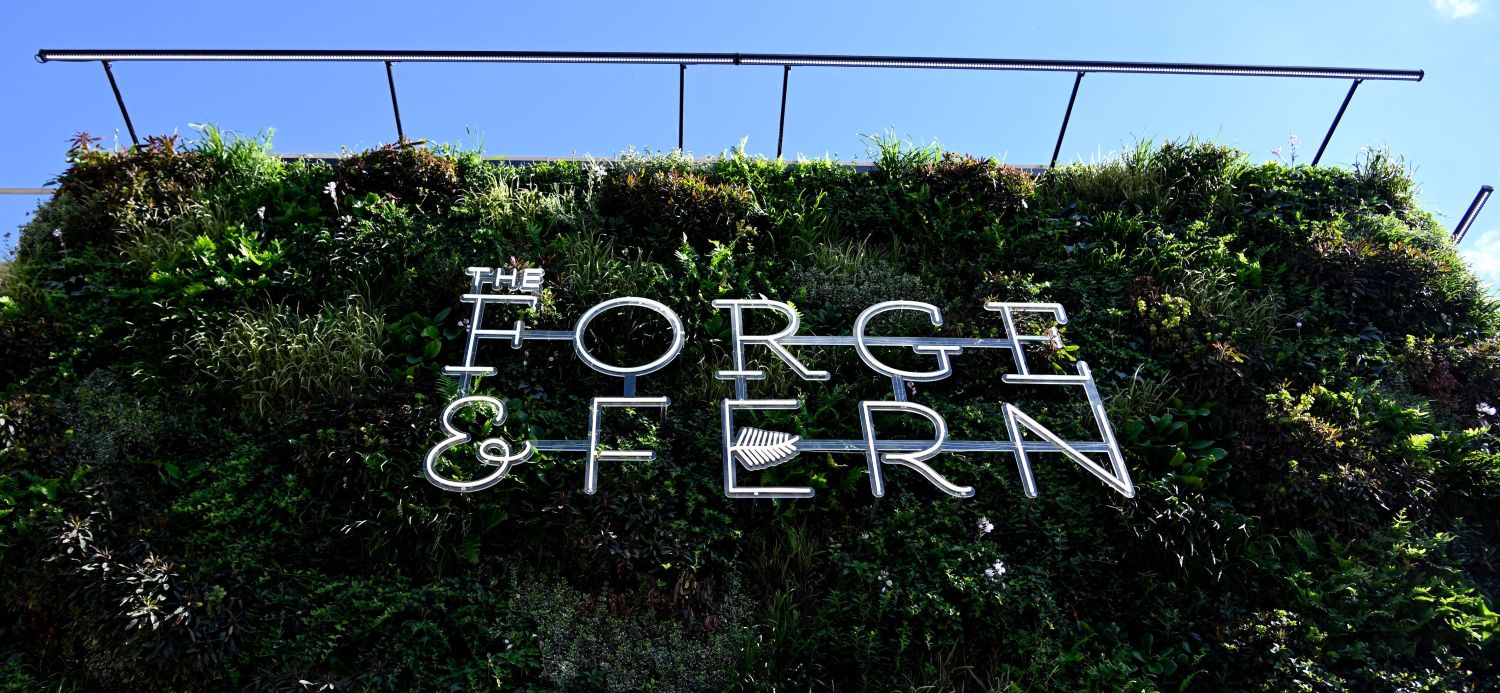The Forge & Fern white LED Custom Neon® outdoor restaurant sign