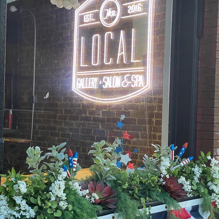 White Custom Neon® logo sign for salon sign @thelocalsalonandspa