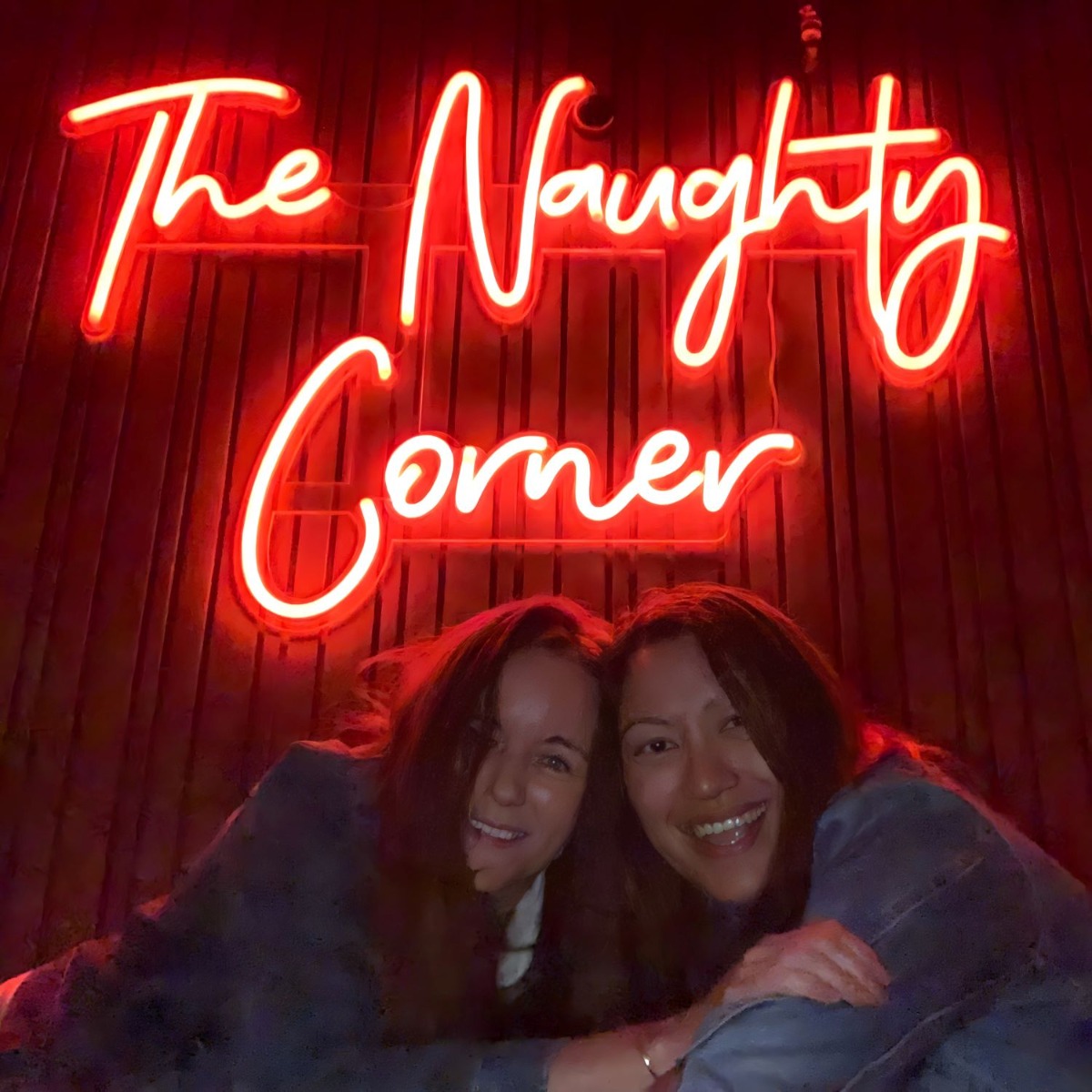 Blue @kaninesocial branded Custom Neon® photo wall sign at Christmas