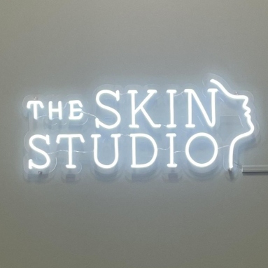 White beauty logo sign by Custom Neon® @theskinstudio