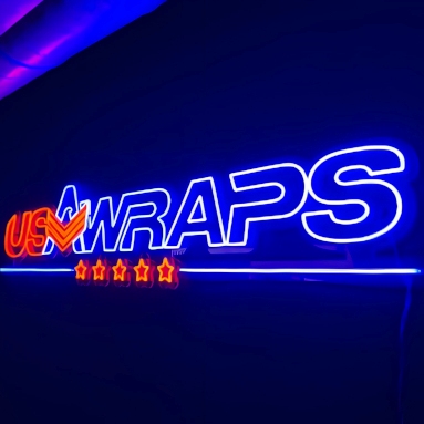 Large Custom Neon® blue and red logo sign on a dark wall @usa_wraps