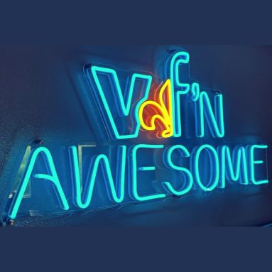 Blue and yellow Custom Neon® office sign reading vf'n awesome @victorianfinance