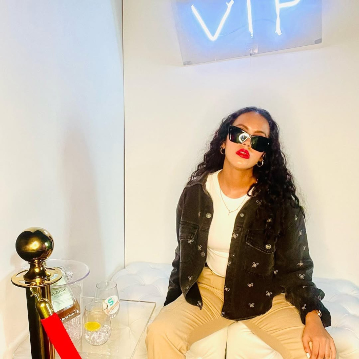 VIP white LED Custom Neon® sign in selfie booth designed by @selfieboxsacramento featuring thavashni_ramdin